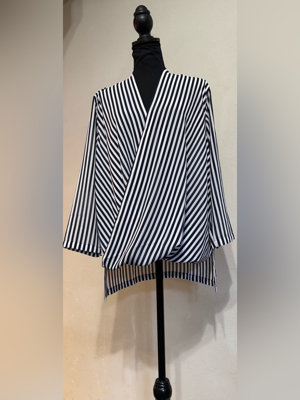 Women’s navy-white striped wrap-style high-low pull-over blouse Size Med. EUC